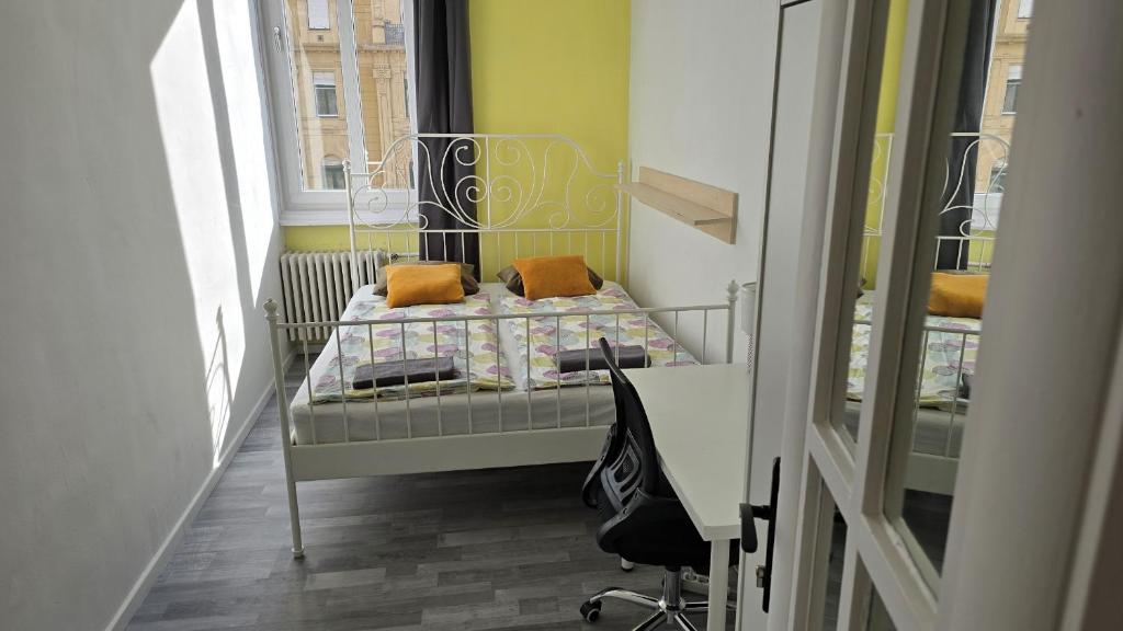 Postel nebo postele na pokoji v ubytování Astoria Guesthouse