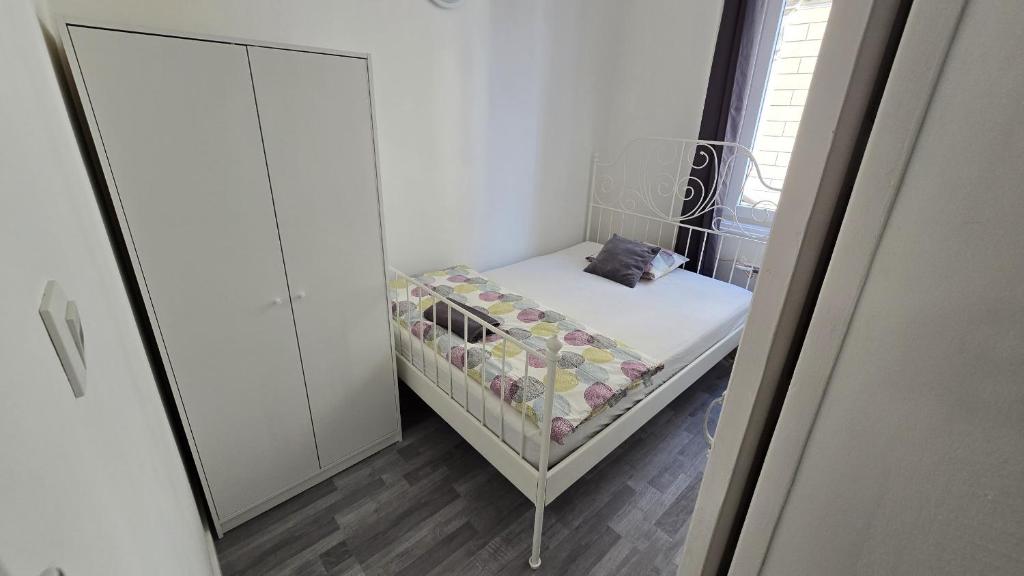 Postel nebo postele na pokoji v ubytování Astoria Guesthouse