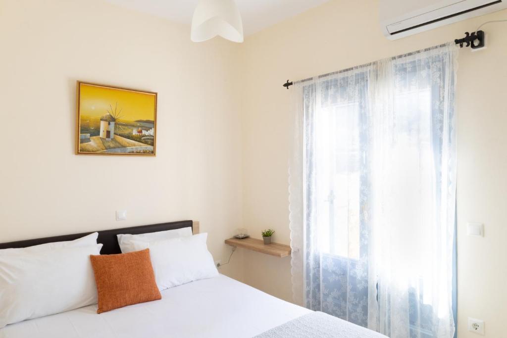 En eller flere senge i et værelse på Villa Divina Private Traditional House