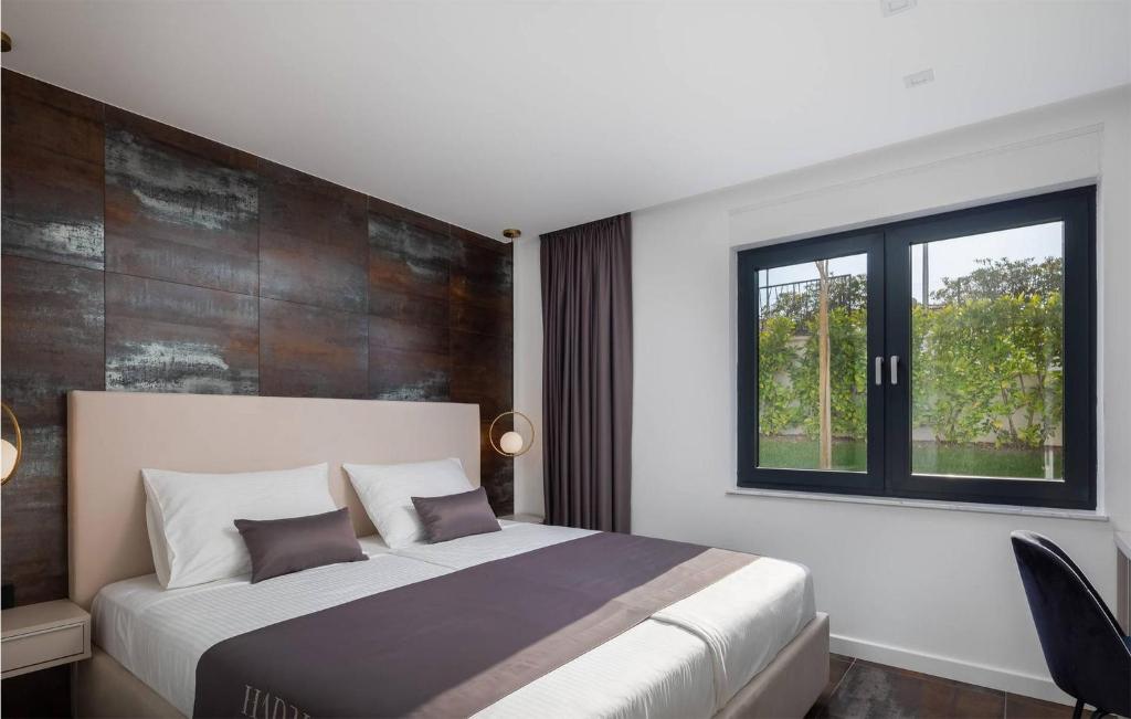 Posteľ alebo postele v izbe v ubytovaní Beautiful Apartment In Zidarici