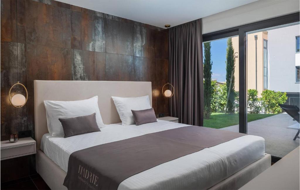Posteľ alebo postele v izbe v ubytovaní Beautiful Apartment In Zidarici