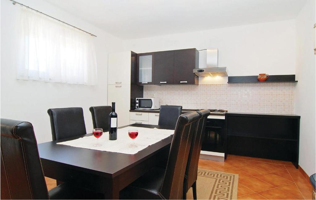 Kuchyňa alebo kuchynka v ubytovaní Apartment Stari Put Iii