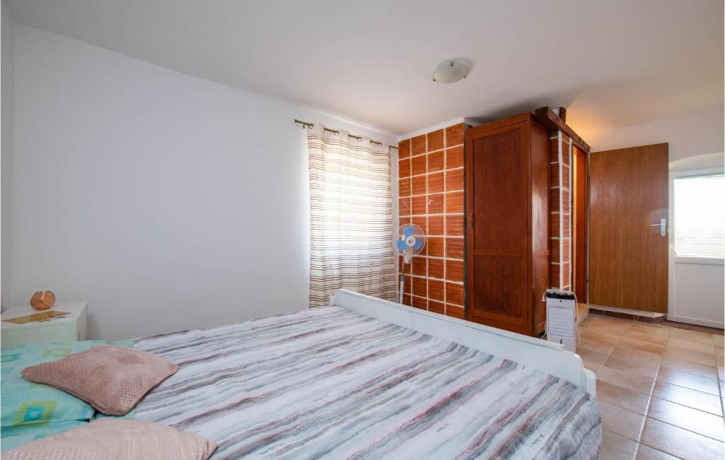 Postel nebo postele na pokoji v ubytování Pet Friendly Home In Peruski With Wifi