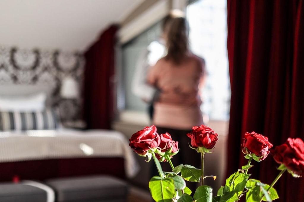 Postel nebo postele na pokoji v ubytování First Hotel Statt Örnsköldsvik