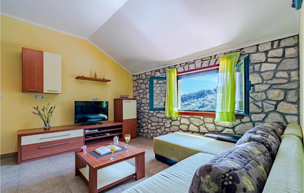 Telewizja i/lub zestaw kina domowego w obiekcie Apartment Crnja Luka I