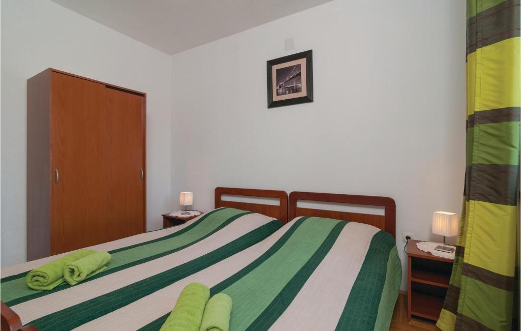 Posteľ alebo postele v izbe v ubytovaní Two-Bedroom Apartment In Split
