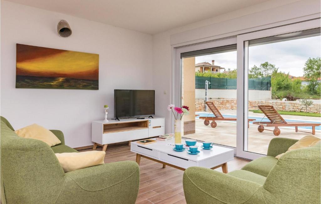 Telewizja i/lub zestaw kina domowego w obiekcie Awesome Home In Putini