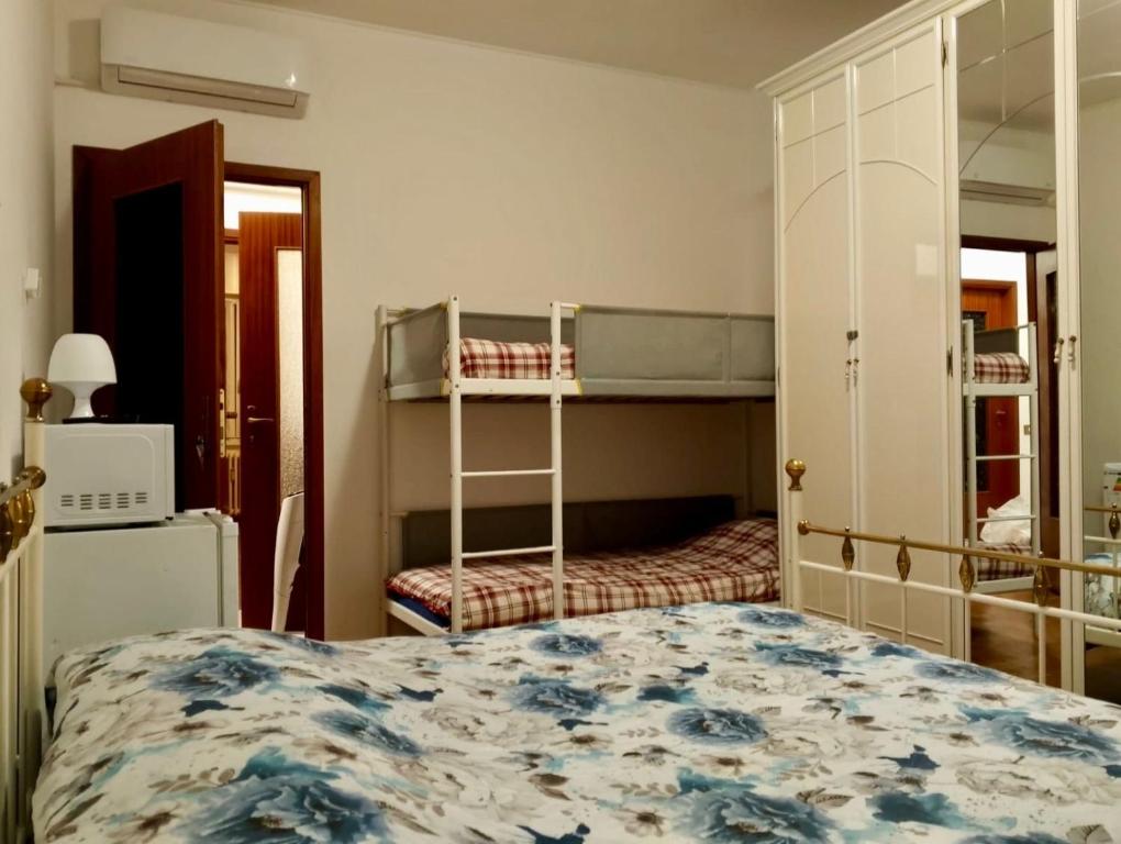 Postel nebo postele na pokoji v ubytování Gigli, rooms con cucina in comune e terrazza