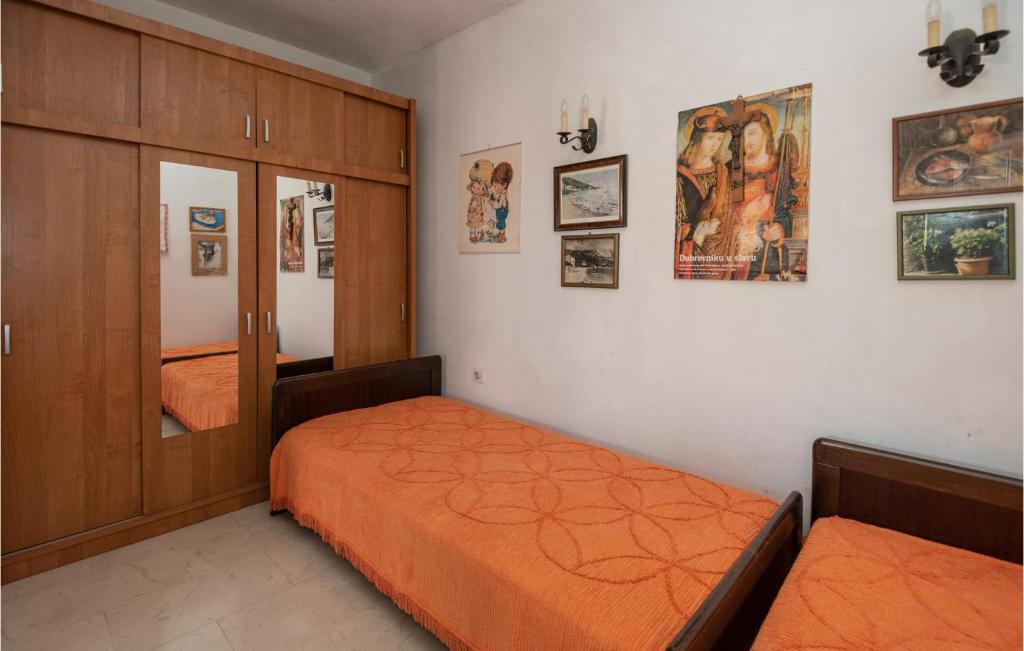 Posteľ alebo postele v izbe v ubytovaní Holiday Home Podgora 14