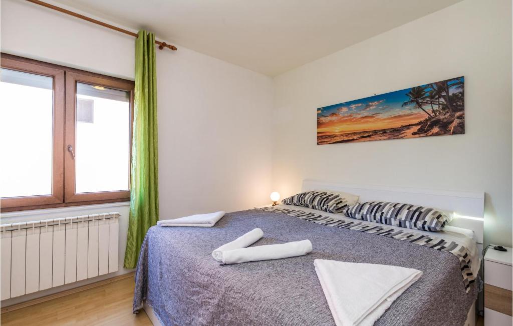 Posteľ alebo postele v izbe v ubytovaní Stunning Apartment In Rijeka