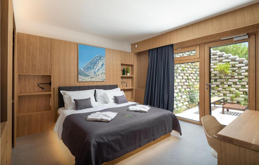 Posteľ alebo postele v izbe v ubytovaní Cozy Home In Omis With Sauna