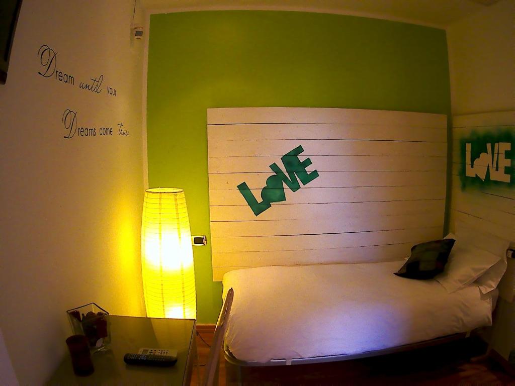 Postel nebo postele na pokoji v ubytování B&B Albaluna