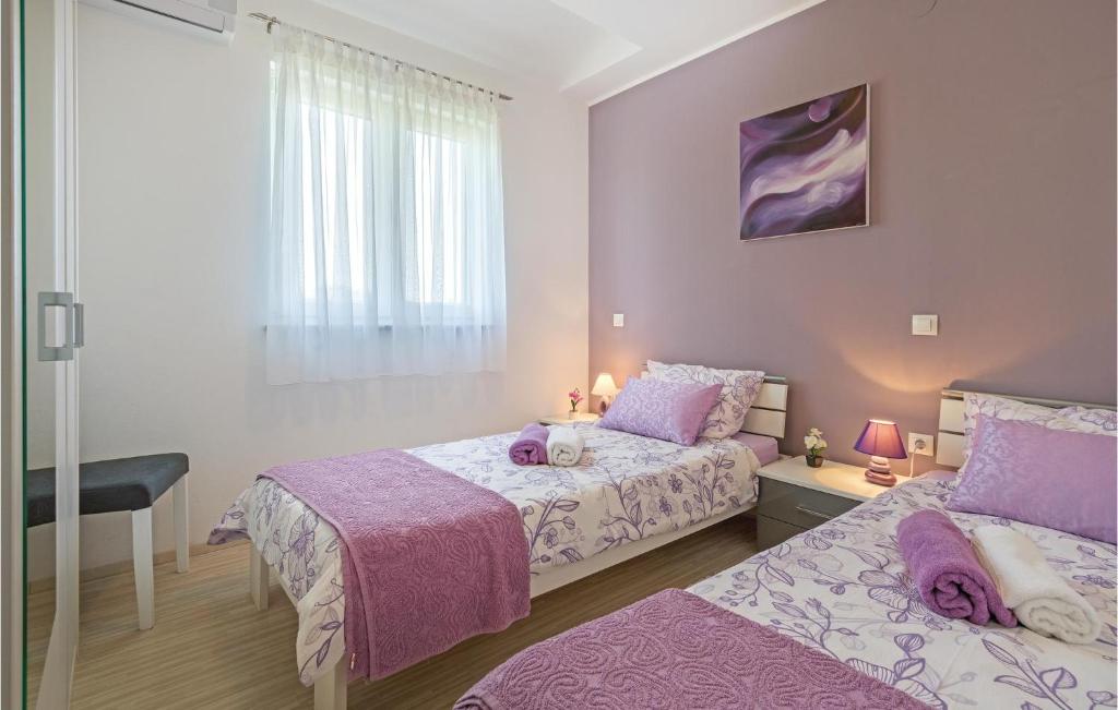 Postel nebo postele na pokoji v ubytování Cozy Home In Pula With Wifi