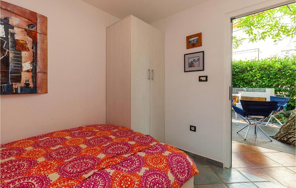 Posteľ alebo postele v izbe v ubytovaní Nice Home In Crikvenica With Kitchen