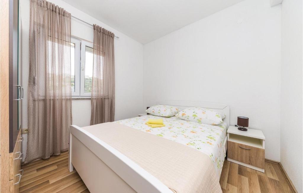 Posteľ alebo postele v izbe v ubytovaní Two-Bedroom Apartment In Sevid