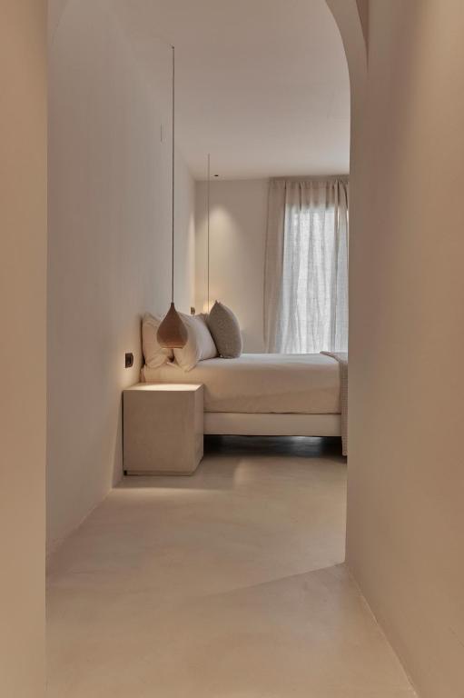 Postel nebo postele na pokoji v ubytování Hotel Avenida