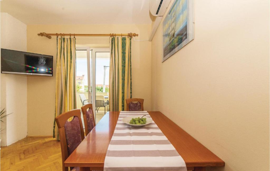 Televízia a/alebo spoločenská miestnosť v ubytovaní Apartment Portorusa Vi