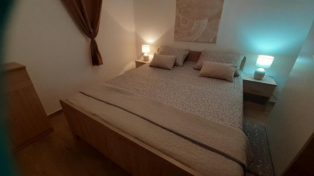 Posteľ alebo postele v izbe v ubytovaní apartmani G&M