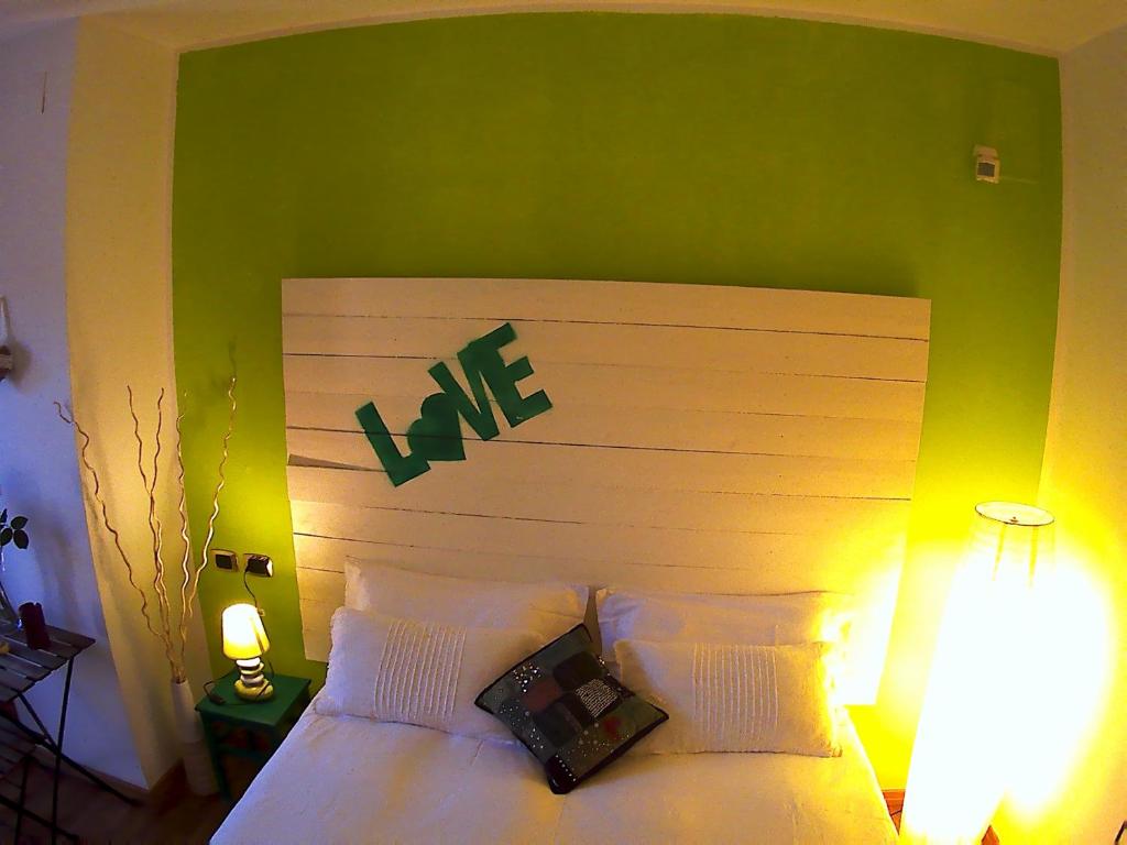 Postel nebo postele na pokoji v ubytování B&B Albaluna