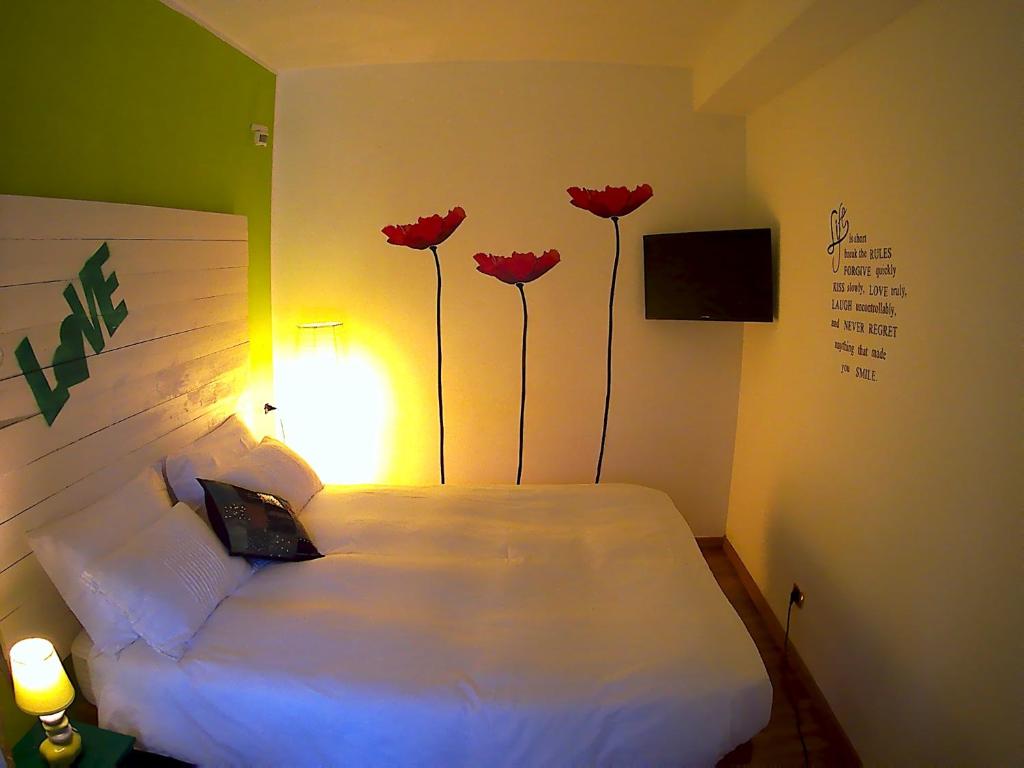 Postel nebo postele na pokoji v ubytování B&B Albaluna