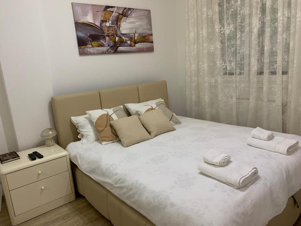 Postel nebo postele na pokoji v ubytování Knebl Apartman