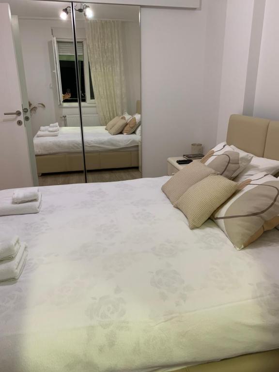 Postel nebo postele na pokoji v ubytování Knebl Apartman