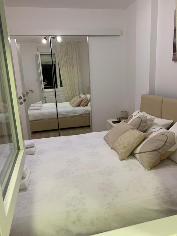 Postel nebo postele na pokoji v ubytování Knebl Apartman