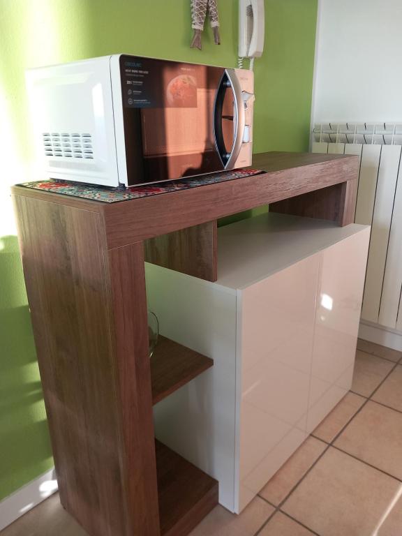 Kuchyň nebo kuchyňský kout v ubytování appartamento Verdemare