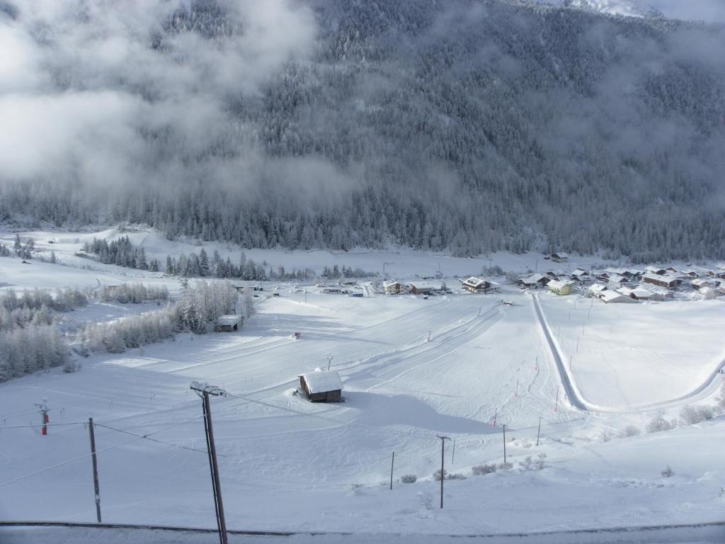 Gästehaus Berghof Schöpf v zimě