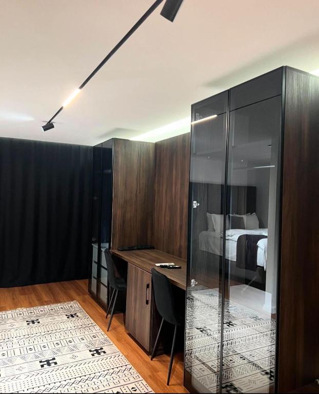 Postel nebo postele na pokoji v ubytování Hotel Europa Prishtina