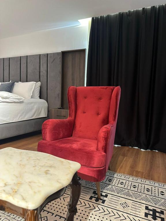 Postel nebo postele na pokoji v ubytování Hotel Europa Prishtina