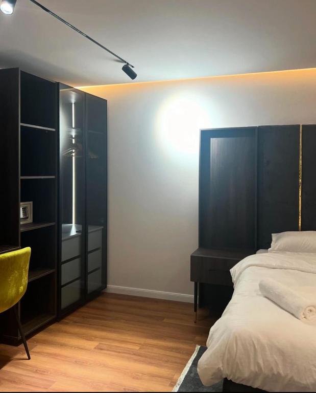 Postel nebo postele na pokoji v ubytování Hotel Europa Prishtina
