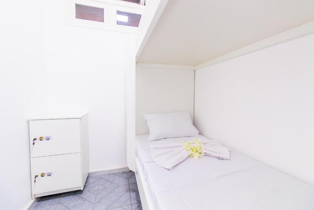 Postel nebo postele na pokoji v ubytování AFS LOFT HOSTEL Aracaju
