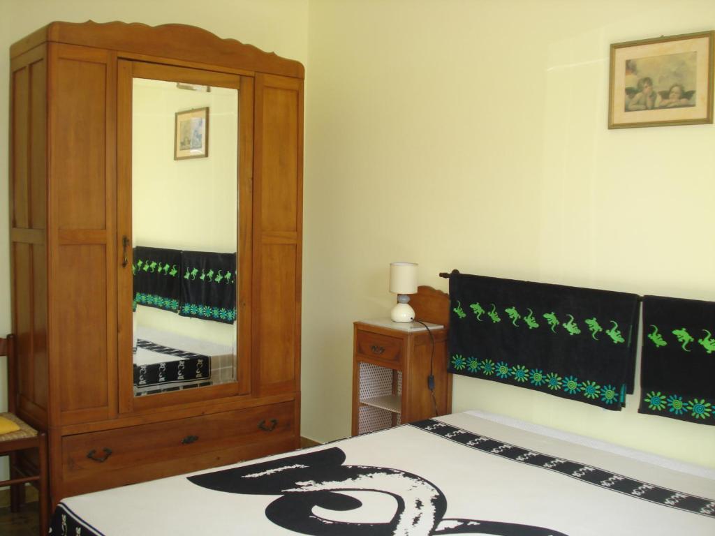 Posteľ alebo postele v izbe v ubytovaní Casa Degli Oleandri Sul Cortile R6314