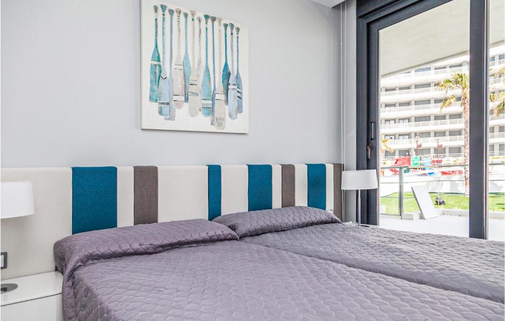 Posteľ alebo postele v izbe v ubytovaní Nice Apartment In Los Arenales Del Sol