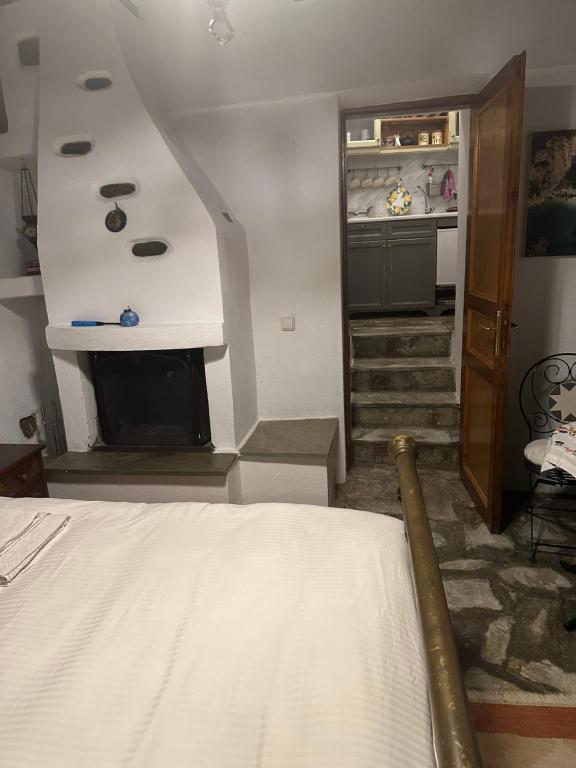 Postel nebo postele na pokoji v ubytování Archontiko Stafylopati