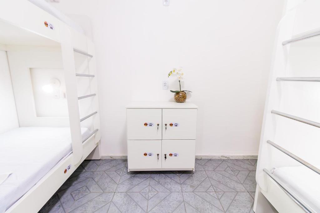 Postel nebo postele na pokoji v ubytování AFS LOFT HOSTEL Aracaju