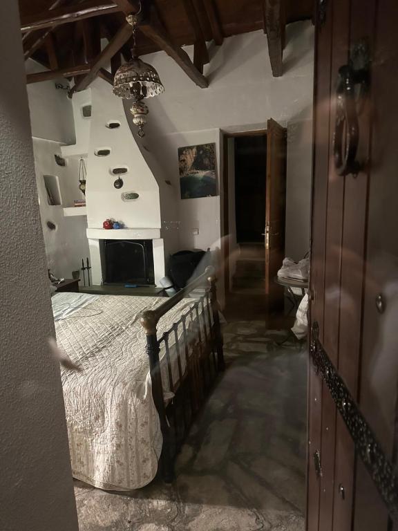 Postel nebo postele na pokoji v ubytování Archontiko Stafylopati