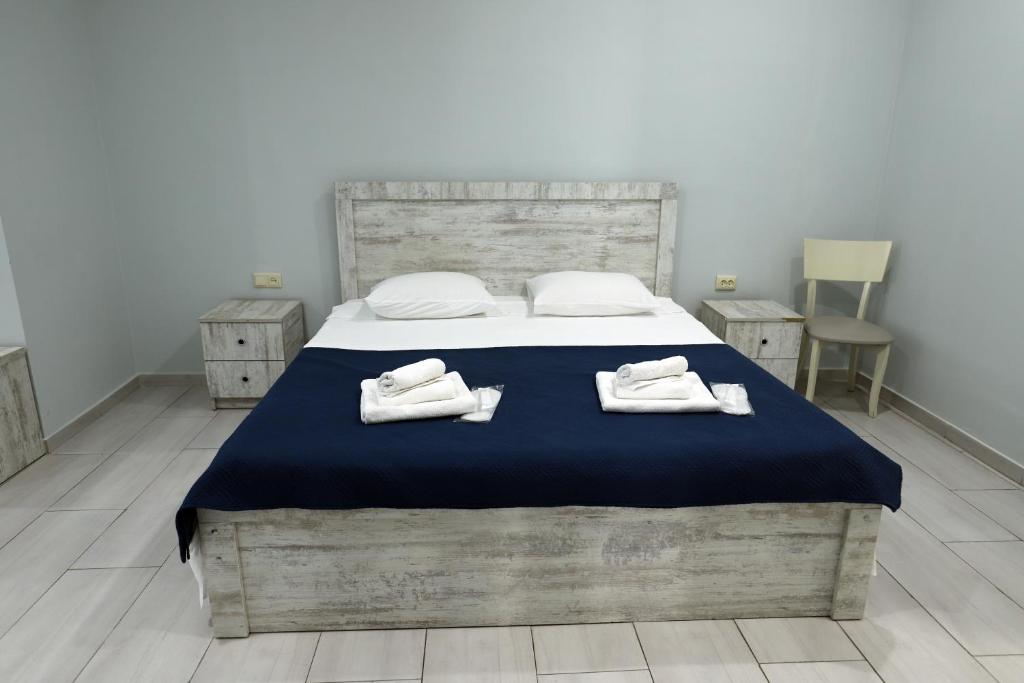 Postel nebo postele na pokoji v ubytování Hotel City Kutaisi