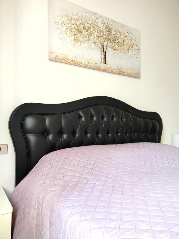 Postel nebo postele na pokoji v ubytování Mazzini Apartment - THE V Collection