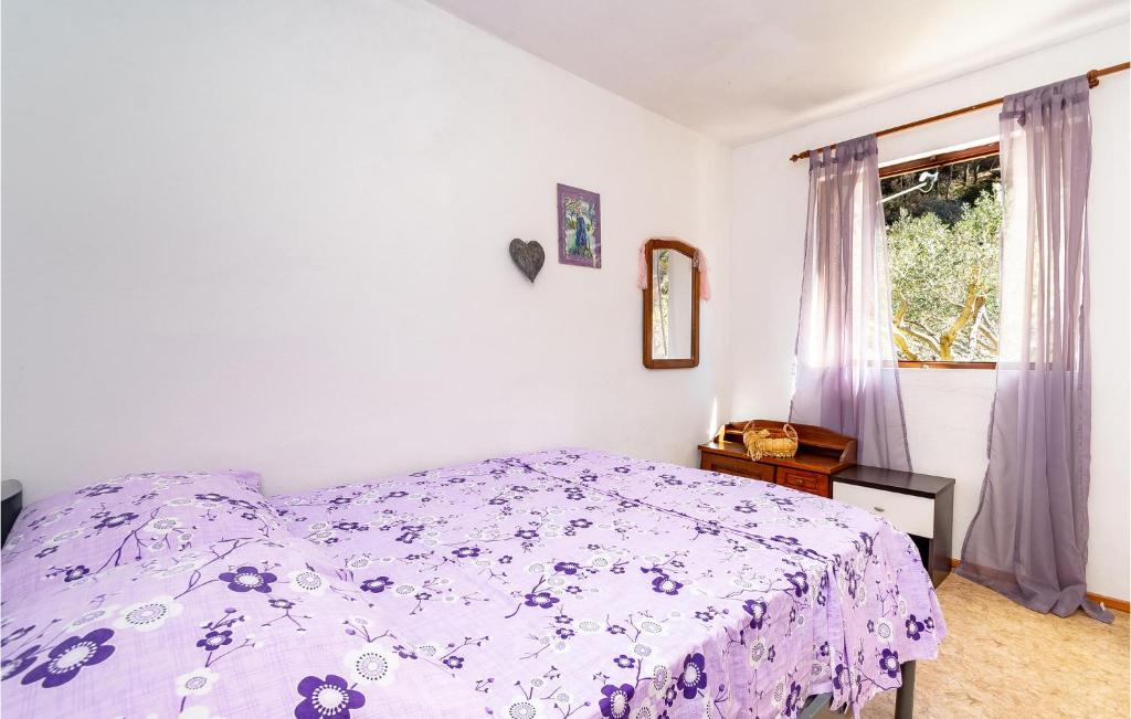 Posteľ alebo postele v izbe v ubytovaní 4 Bedroom Awesome Home In Pupnat