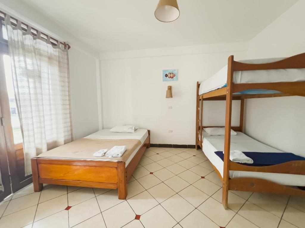 Postel nebo postele na pokoji v ubytování Hotel Luna Nueva
