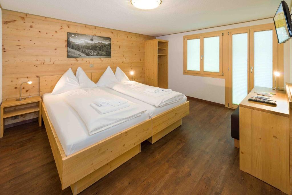 Postel nebo postele na pokoji v ubytování B&B AZapartments Lunic