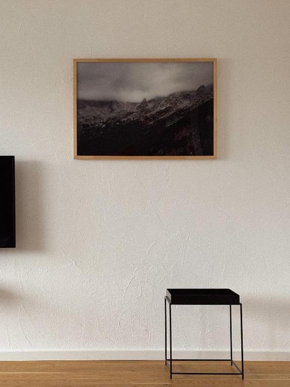 TV a/nebo společenská místnost v ubytování Grüezi Laax Apartments