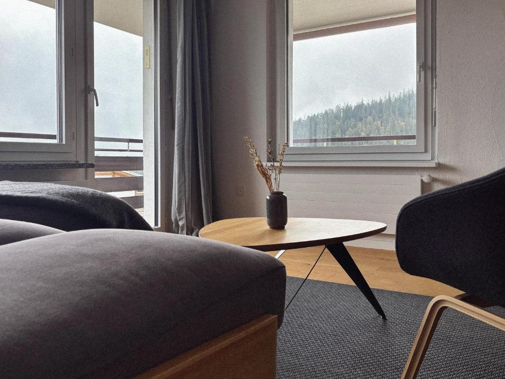 Posezení v ubytování Grüezi Laax Apartments