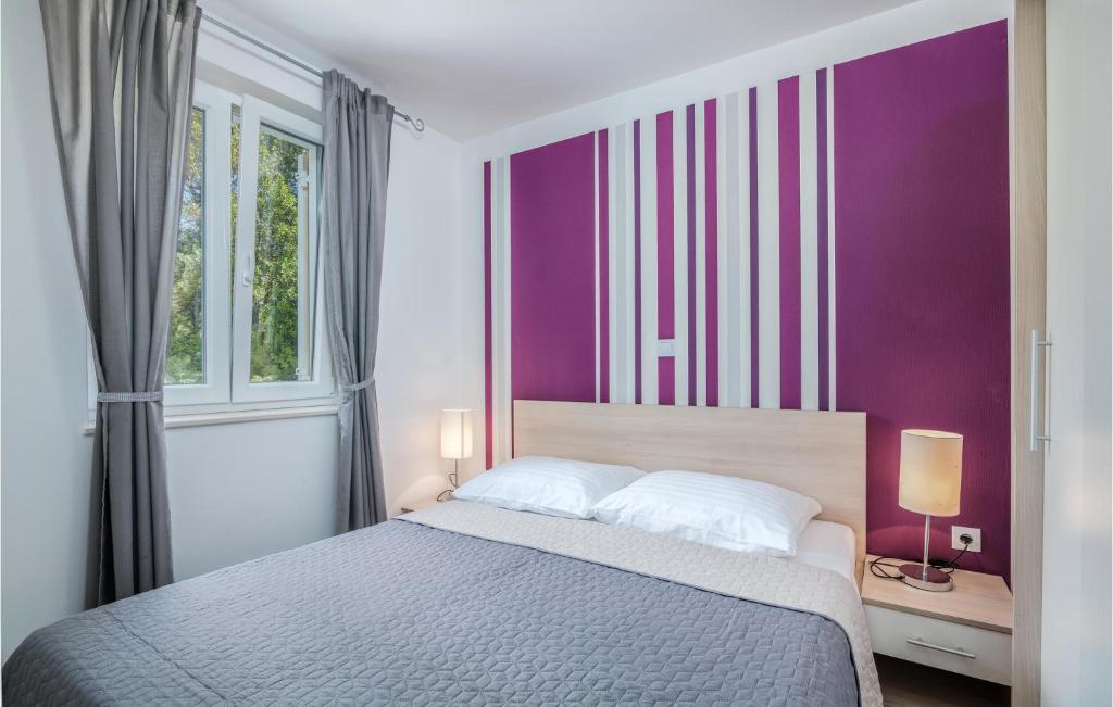 Posteľ alebo postele v izbe v ubytovaní Cozy Apartment In Baska With Wifi