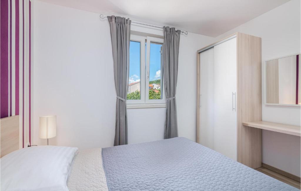 Posteľ alebo postele v izbe v ubytovaní Cozy Apartment In Baska With Wifi
