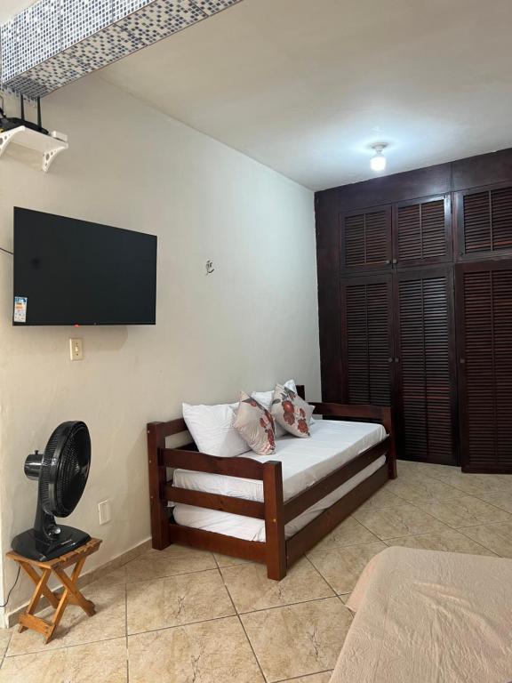 TV a/nebo společenská místnost v ubytování Estalagem pé na areia