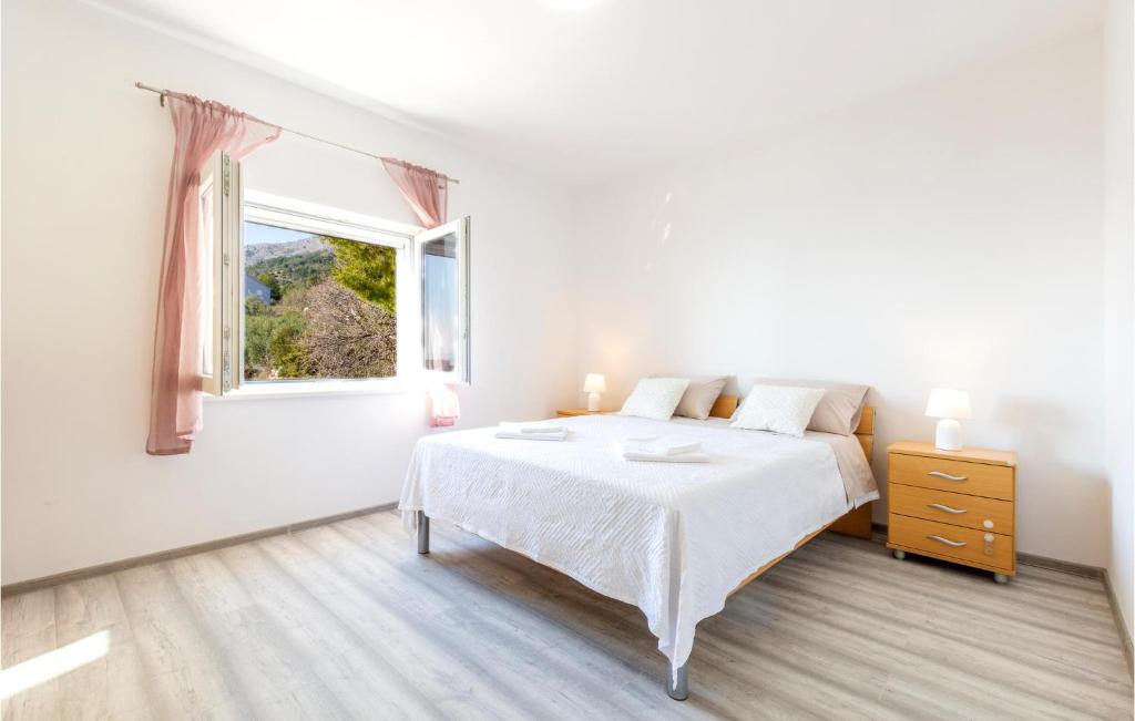Posteľ alebo postele v izbe v ubytovaní Cozy Apartment In Suvi Potok, Jesenice,
