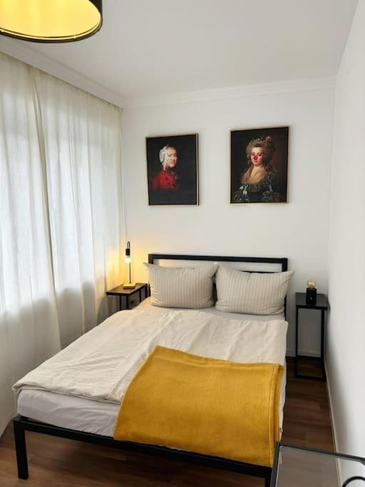 Ένα ή περισσότερα κρεβάτια σε δωμάτιο στο Zentrum - am Dom - Wohnung